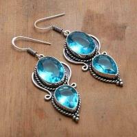 Tpz 740a boucles oreilles pendants 12gr 12x16mm paire topaze bleu suisse argent 925 vente achat 1